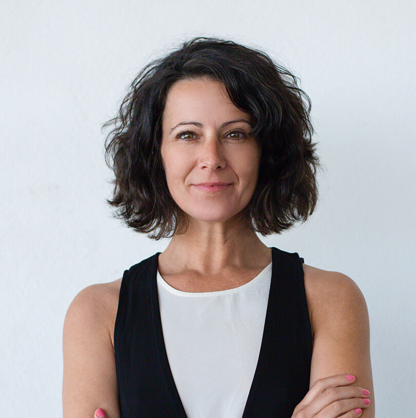cheerful-middle-aged-woman-with-curly-hair (1) Team image 2